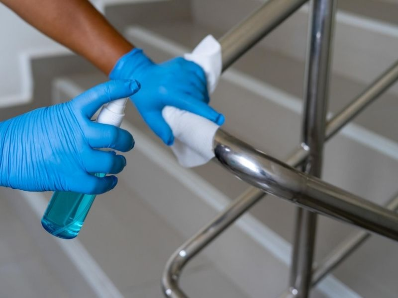 Cleaning decorative stainless steel pipes.